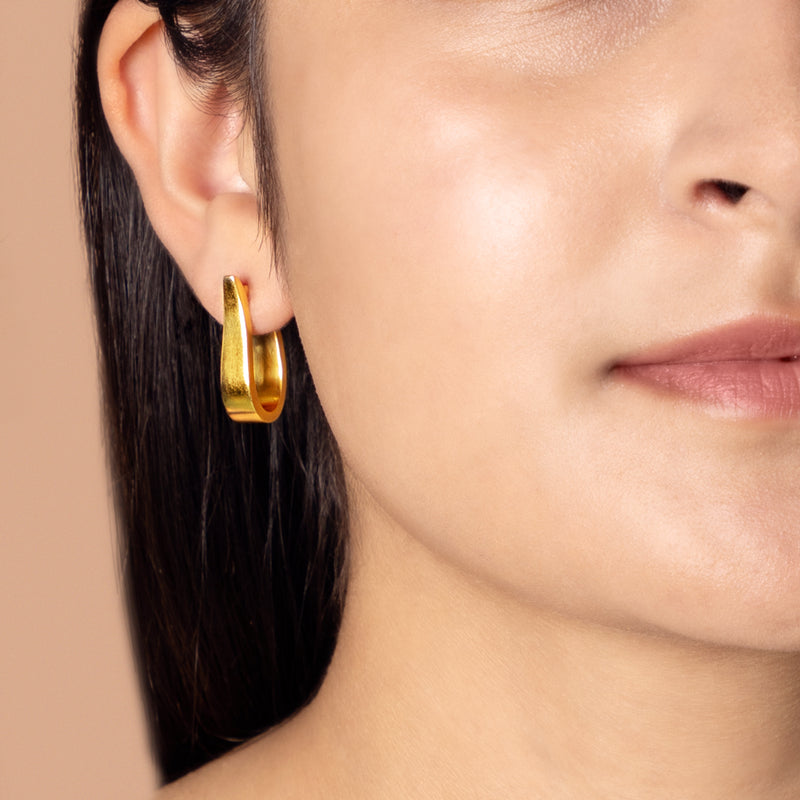 Modern Curve Hoops in Gold