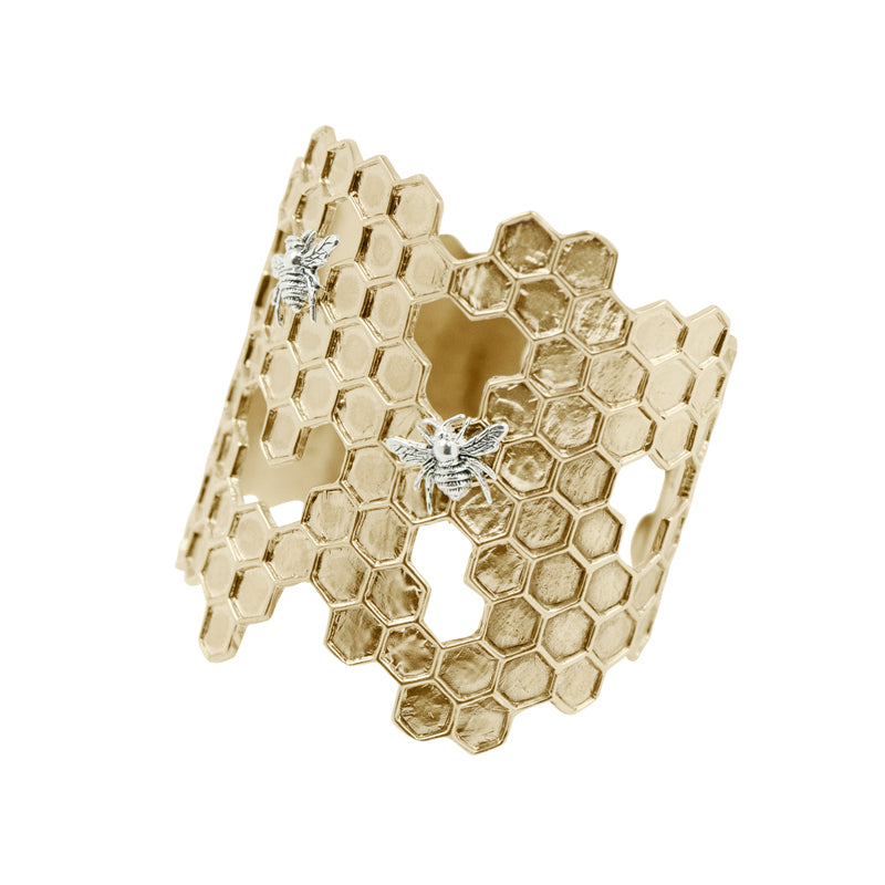 Modern Honeycomb Cuff is store available only in brass and gold